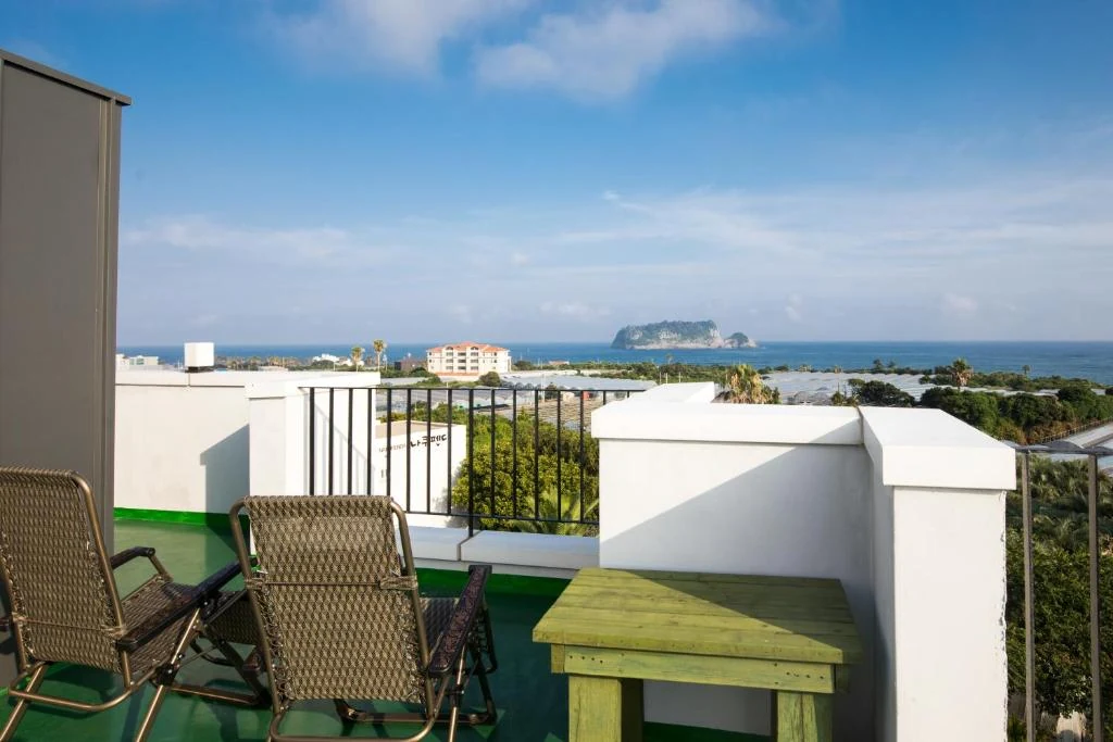 Terrace chairs with a view towards the sea